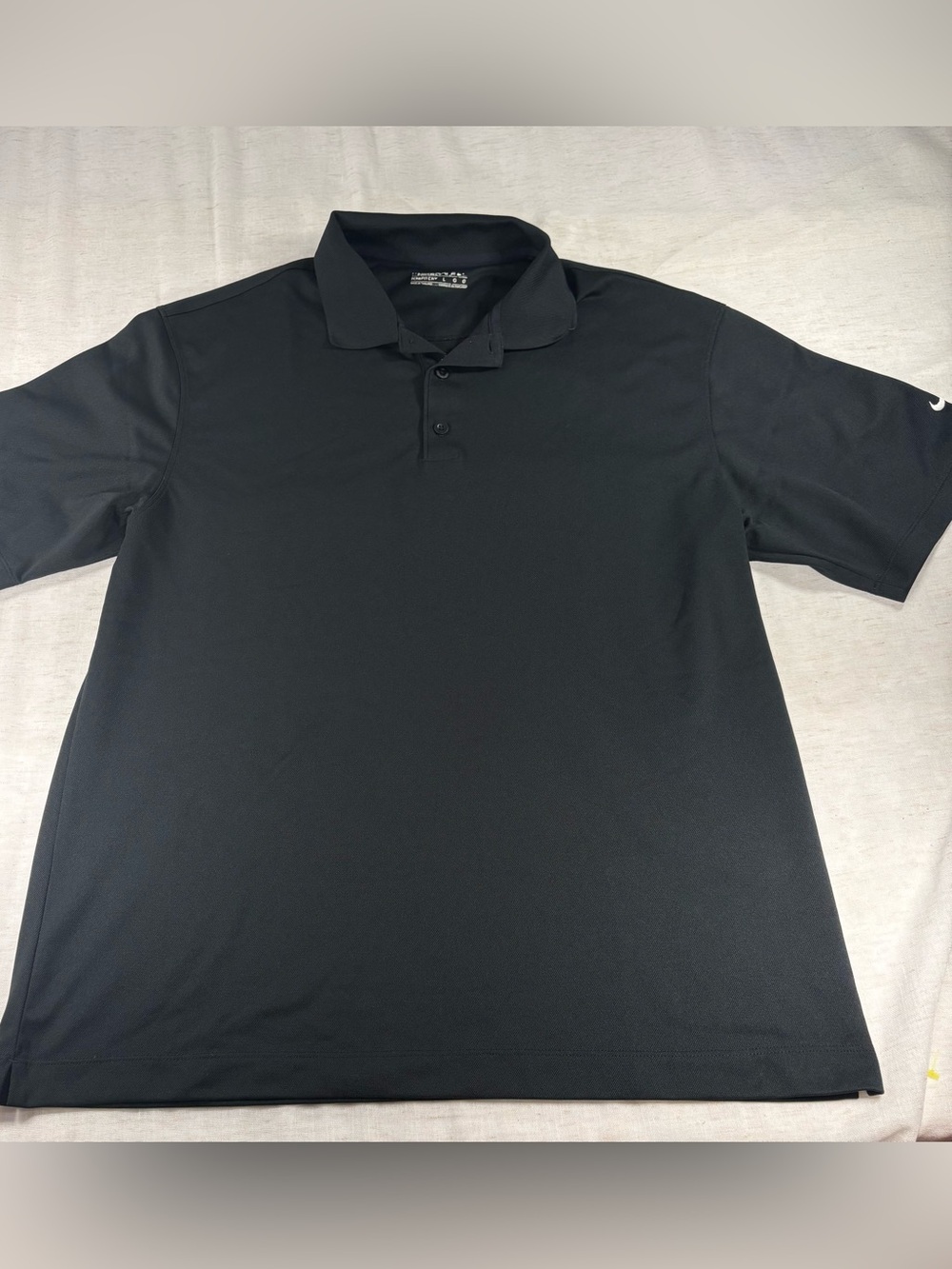Nike Men’s Black Polo Shirt with White Swoosh